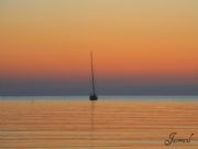 AMANECER Y BARCO