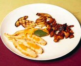 Mero a la naranja con setas